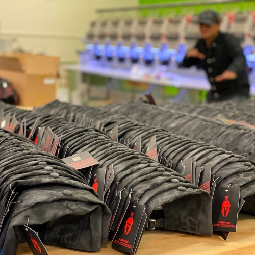 Custom apparel orders tagged and packed for delivery